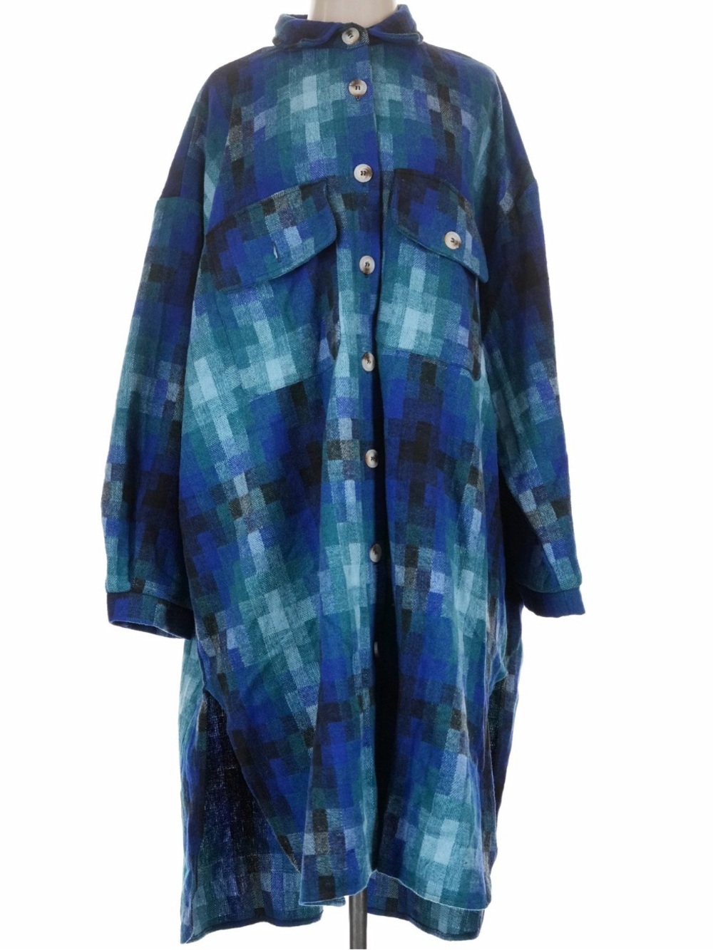Dressed in LALA Blue Dress with a Unique Pixelated Pattern